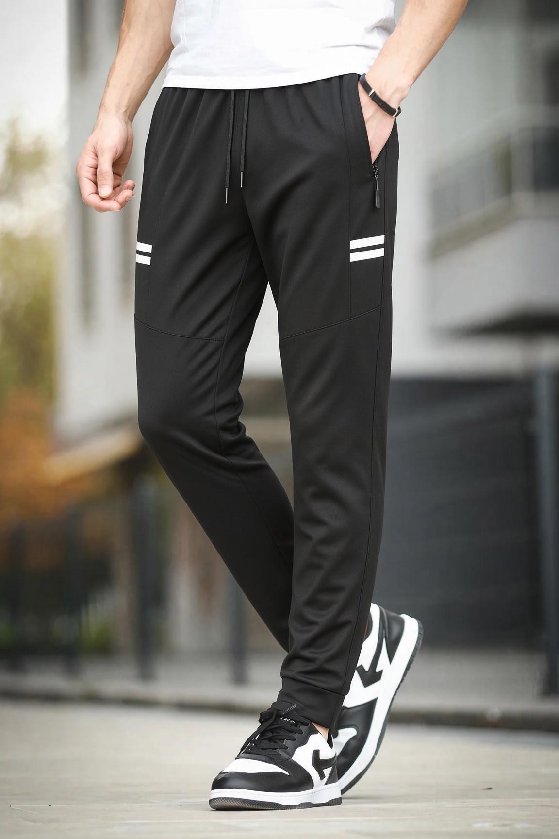 Dual Yanı Çift Şerit Detaylı Fermuar Cepli Beli Bağcıklı Paçası Manşetli Slim Fit Eşofman Altı